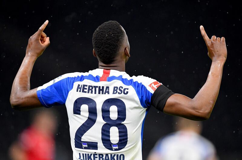 Hertha's Dodi Lukebaki, celebrates after scoring his side's second goal. AP