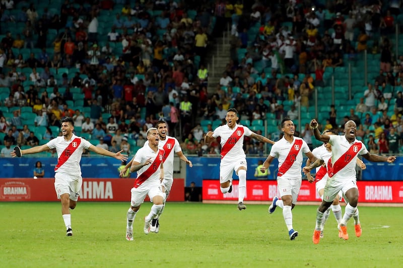 Peru players celebrate after beating Uruguay in the Copa America quarter-finals. EPA