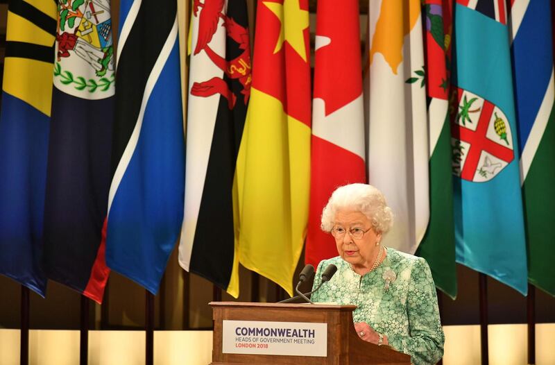 Britain's Queen Elizabeth II speaks at the formal opening of the Commonwealth Heads of Government Meeting (CHOGM) at Buckingham Palace in London on April 19, 2018. 
Queen Elizabeth II, the Head of the Commonwealth opened the Commonwealth summit for what may be the last time today. / AFP PHOTO / POOL / Dominic Lipinski