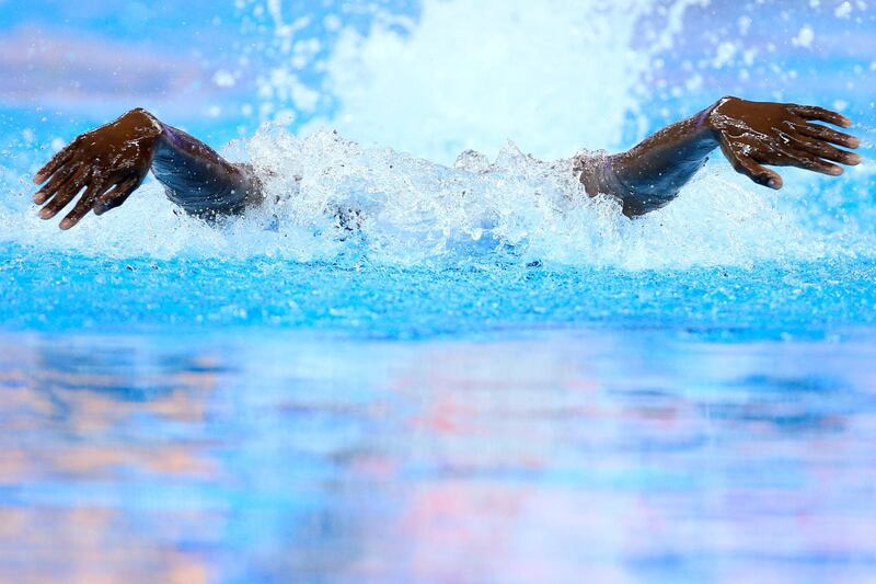Collins Saliboko of Tanzania competes in the men's butterfly at the Fina World Swimming Championships in Beijing. Reuters