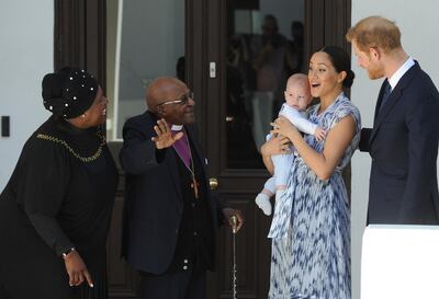 Britain's Prince Harry and Meghan, Duchess of Sussex, holding their son Archie, meets with Anglican Archbishop Emeritus, Desmond Tutu, and his wife Leah in Cape Town, South Africa, Wednesday, Sept. 25, 2019. The royal couple are on the third day of their African tour. (Henk Kruger/African News Agency via AP, Pool)