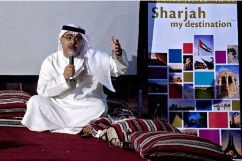 The UAE writer, poet and researcher Abdulaziz AlMusallam tells stories and fairy tales to those attending the World Tourism Day event and dinner at the Sharjah Tourism Desert Camp.