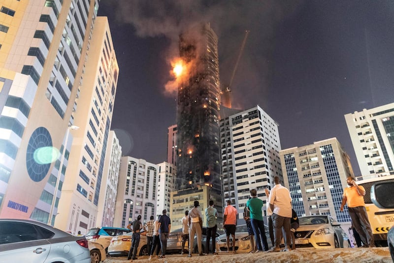 SHARJAH, UNITED ARAB EMIRATES. 05 MAY 2020. STANDALONE. Fire at the Abbco Tower near Nahda Park in Sharjah. Police and fire fighters responded to a blaze that was reported after 8:30. (Photo: Antonie Robertson/The National) Journalist: Salam Al Amir. Section: National.