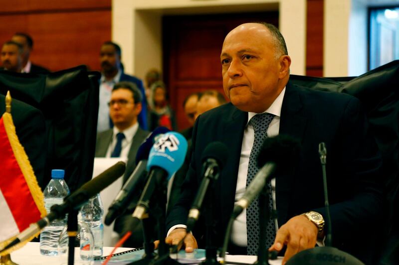 Egyptian Foreign Minister Sameh Shukri attends the tripartite talks over an Ethiopian controversial dam being built on the Blue Nile, in Khartoum, on april 5, 2018.
Sudan hosts talks with Egypt and Ethiopia as tensions rose in the past years over a dam Ethiopia is building on the Blue Nile, which Egypt worries will be impact its share of the Nile, in which it relies almost totally on for irrigation and drinking water. / AFP PHOTO / ASHRAF SHAZLY