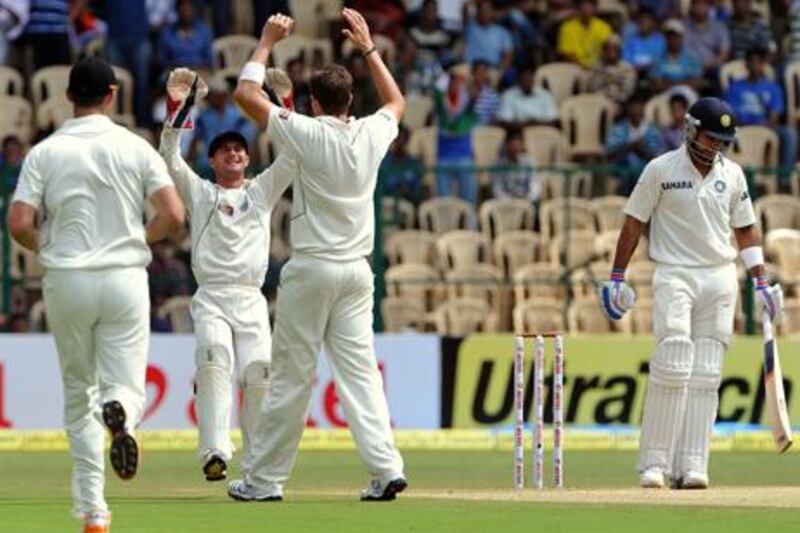 New Zealand's Tim Southee celebrates after taking Virat Kohli's wicket during the second Test against India.