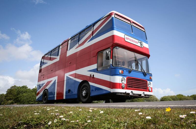 EDITORIAL USE ONLY
Mega-fan Suzanne Godley is listing the original Union Jack-painted Spice Bus from the 1997 movie Spice World on Airbnb, where itÕll be available for guests to book an overnight stay onboard on 14th and 15th June at Wembley Park in London. PRESS ASSOCIATION Photo. Issue date: Wednesday May 15, 2019. The recently renovated living area features pink Union Jack cinema chairs below a ÔGirl PowerÕ neon light installation, and is fully stocked with vintage 90s magazines and CDs to help recreate the 90s era. Upstairs thereÕs a dressing area and an adjoining bedroom, fitted with animal-print carpet and bedding for three guests. To view the Spice Bus listing on Airbnb, visit https://www.airbnb.co.uk/rooms/34270765 Photo credit should read: Matt Alexander/PA Wire