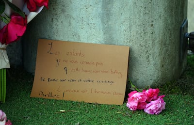 Tributes near the scene at a lakeside park in Annecy, France, after a knife attack in which four toddlers and two adults were injured. PA 