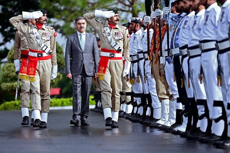 Pakistan's caretaker Prime Minister, Anwaar-ul-Haq Kakar, is presented with guard of honour in Islamabad last week. AFP