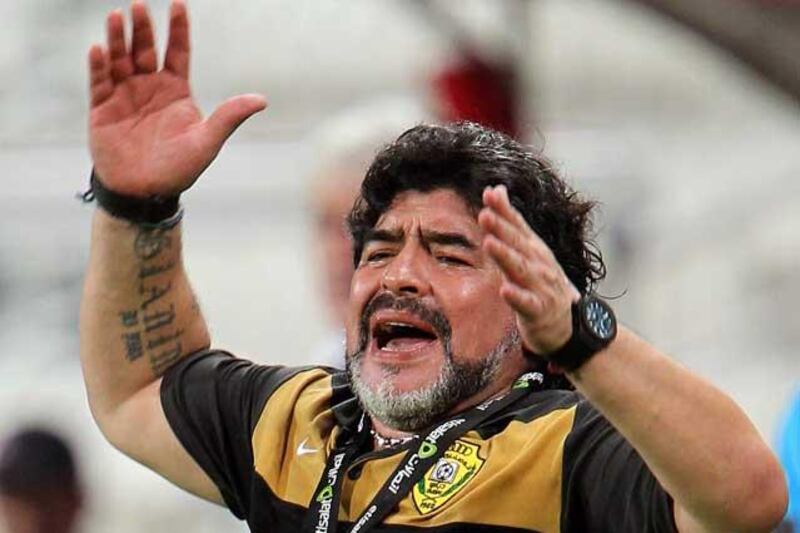 Heartache: Maradona reacting during the Etisalat Emirates Cup soccer match against Aljazira Club at Mohammed Bin Zayed Stadium- Aljazira Club in Abu Dhabi, United Arab Emirates. Photo: EPA / Ali Haider