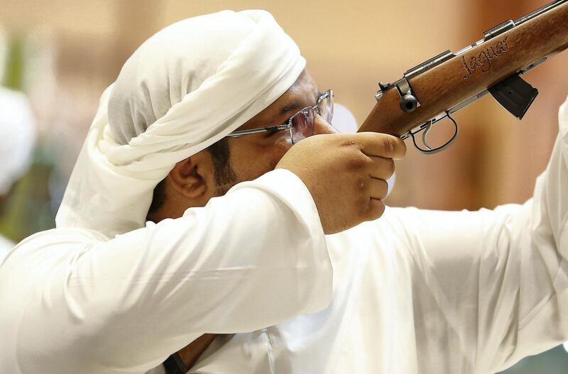 ABU DHABI ,  UNITED ARAB EMIRATES , AUGUST 27 – 2019 :- Visitor looking guns at the Bynuna stand during the ADIHEX 2019 held at ADNEC in Abu Dhabi. ( Pawan Singh / The National ) For News/Online/Instagram/Big Picture. Story by Daniel 
