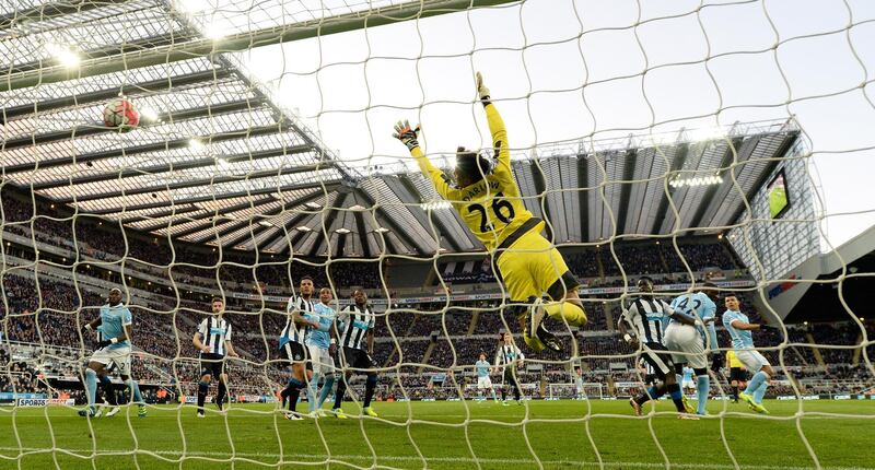 NEWCASTLE UPON TYNE, ENGLAND - APRIL 19:  Newcastle goalkeeper Karl Darlow is beaten by a header from Sergio Aguero (r) for the first goal during the Barclays Premier League match between Newcastle United and Manchester City at St James' Park on April 19, 2016 in Newcastle Upon Tyne, England  (Photo by Stu Forster/Getty Images)