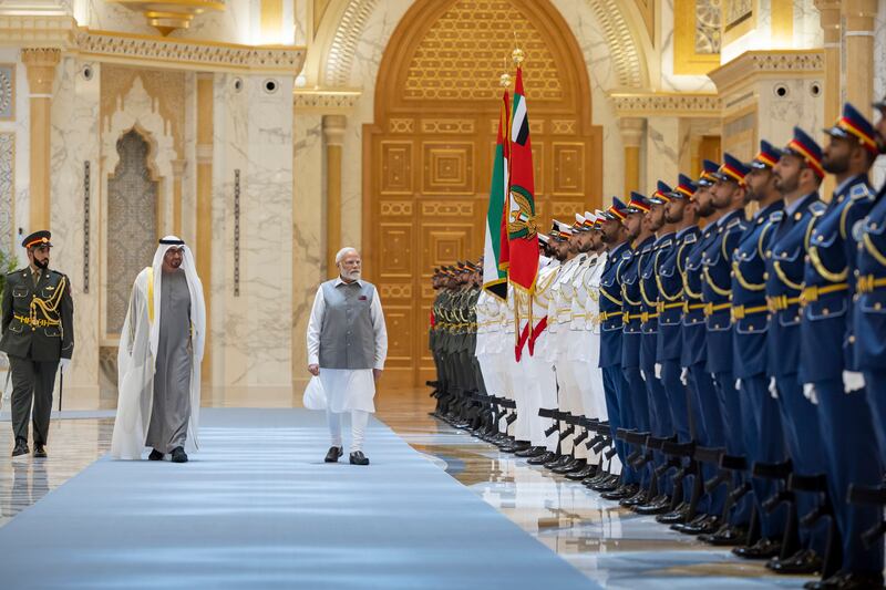 President Sheikh Mohamed and Prime Minister of India Narendra Modi inspect an Armed Forces honour guard during a reception at Qasr Al Watan. Ryan Carter / UAE Presidential Court