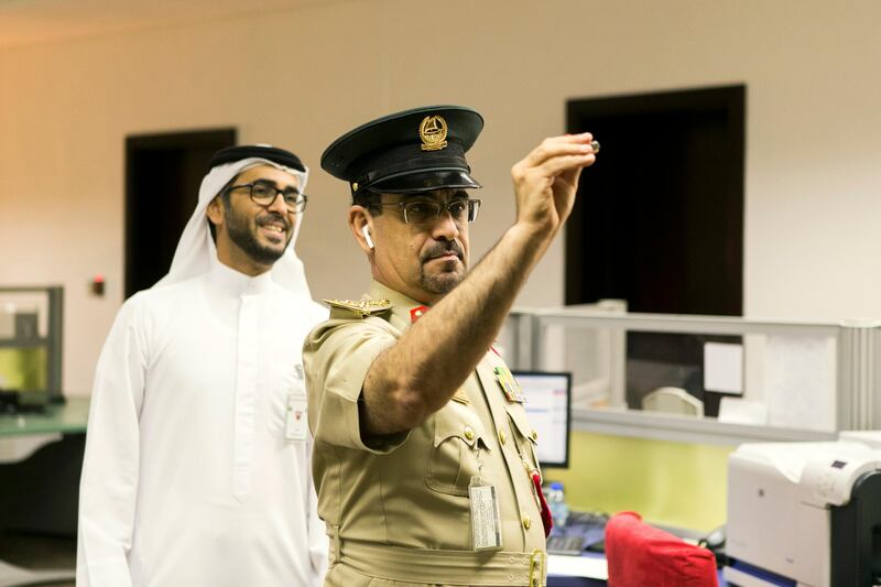 Gen Jasim Mirza from Dubai Police tries his hand at darts.