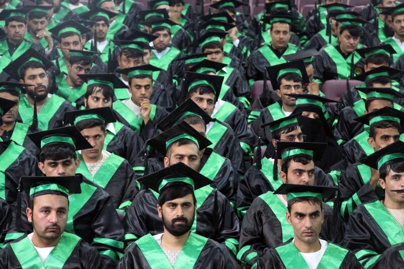 Students attend their graduation ceremony in Kandahar, Afghanistan. EPA