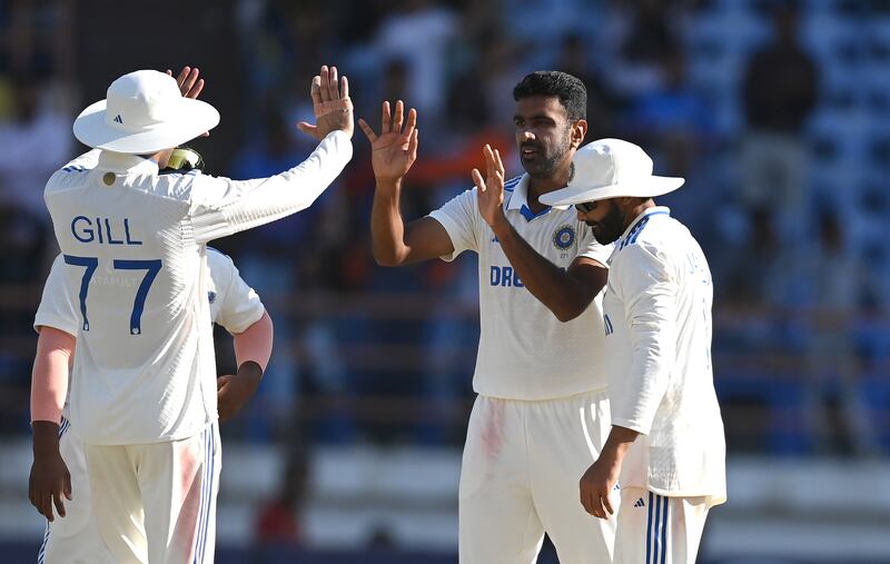 India bowler Ravichandran Ashwin celebrates with teammates after taking the wicket of Tom Hartley for 16. Getty Images