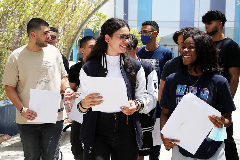 Pupils on A-Level results day at the Gems Metropole School in Motor City, Dubai. Pawan Singh / The National