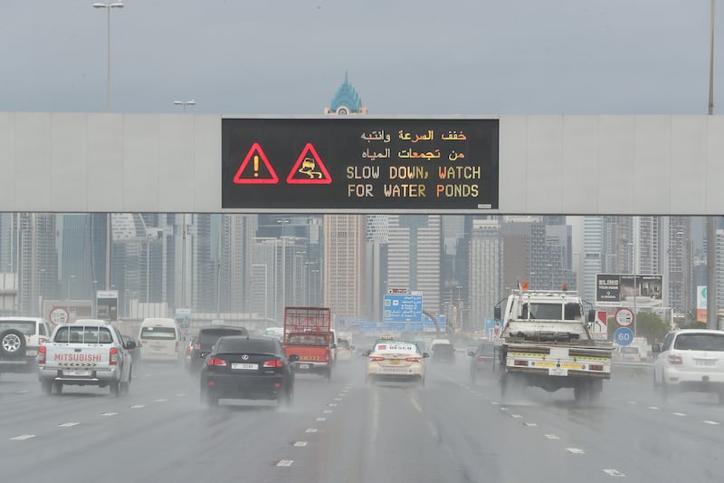 Traffic moved slowly on Al Khail road because of heavy rain. Pawan Singh / The National