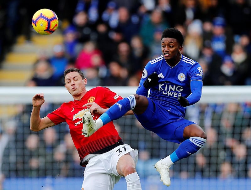 Leicester City's Demarai Gray in action with Matic. Reuters