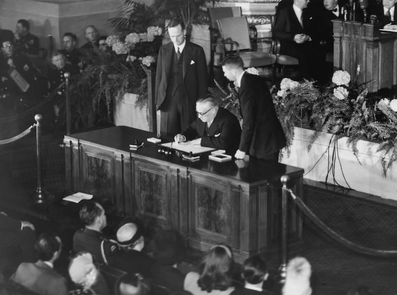 British Foreign Secretary Ernest Bevin signs the North Atlantic Treaty in Washington on April 4, 1949. All photos: Getty 