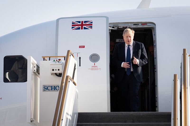 Britain's Prime Minister Boris Johnson arrives at Abu Dhabi airport at the start of his visit to the UAE and Saudi Arabia. Reuters