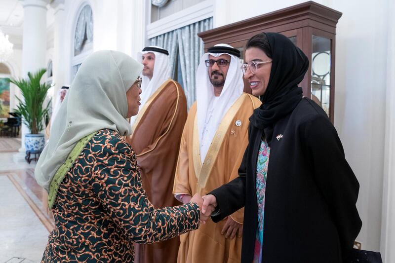 SINGAPORE, SINGAPORE - February 28, 2019: HE Halimah Yacob, President of Singapore (L), greets HE Noura Mohamed Al Kaabi, UAE Minister of Culture and Knowledge Development (R), prior to a meeting, at the Istana presidential palace.
 ( Mohamed Al Hammadi / Ministry of Presidential Affairs )
—