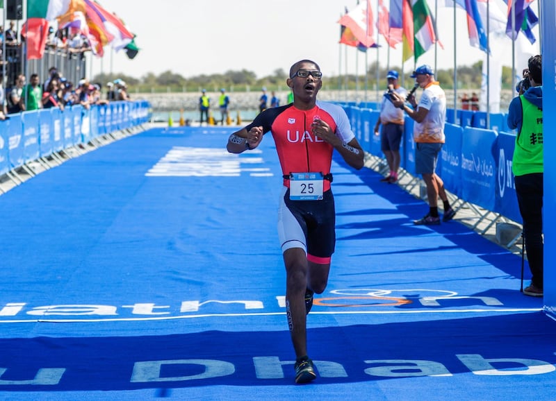 Abu Dhabi, United Arab Emirates, March 8, 2019.  Special Olympics ITU Traiathlon at the YAS Marina Circuit. -Jonah Hambleton finishes the triathlon.
Besa/The National
Section:  NA
Reporter:  Haneen Dajani