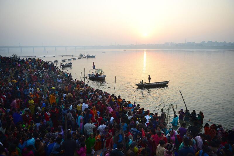 Indian Hindu devotees perform religious rituals at Baluaghat in Allahabad. AFP