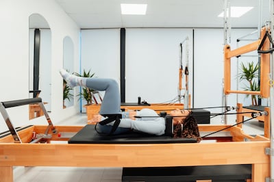 Reformer Pilates is equipment-based and is recommended for those already familiar with the basics. Photo: Ahmet Kurt / Unsplash