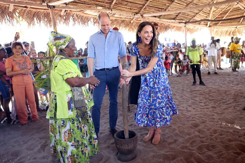 A laughing Prince William and Kate spend time in Hopkins. Reuters