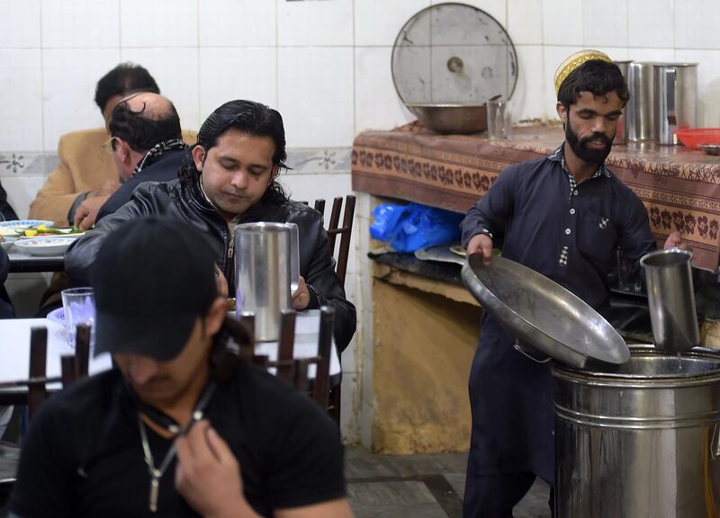 Rozi Khan working at Dilbar Hotel in Rawalpindi. AFP