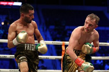 Sunny Edwards (green gold and black shorts) takes on Muhammad Waseem in the IBF Flyweight Title match. Dubai tennis stadium. Chris Whiteoak / The National