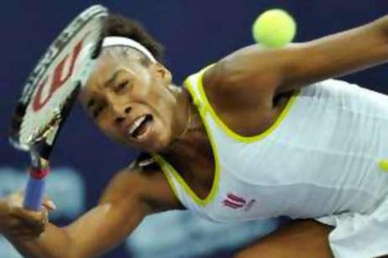 Venus Williams of the U.S. returns the ball during her semi final match against Serbia's Ana Ivanovic at the WTA Zurich Open tennis tournament at the Hallenstadion in Zurich October 18, 2008. Williams won the match 4-6 6-3 6-4.  REUTERS/Arnd Wiegmann  (SWITZERLAND) *** Local Caption ***  ZUR413_TENNIS-WOMEN_1018_03.JPG