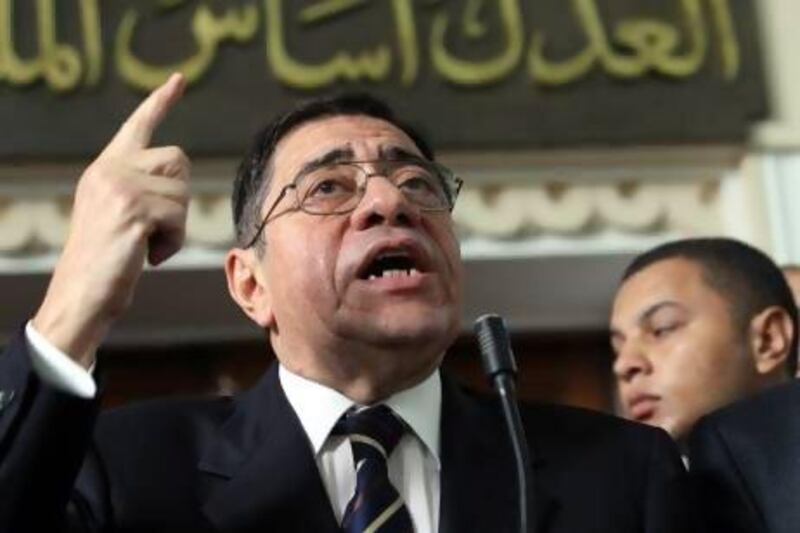 Adding to the signs of a protracted stand-off, a court has ruled that Abdel Meguid Mahmoud, the prosecutor general that Mr Morsi unilaterally fired in a controversial move last November, should be reinstated.