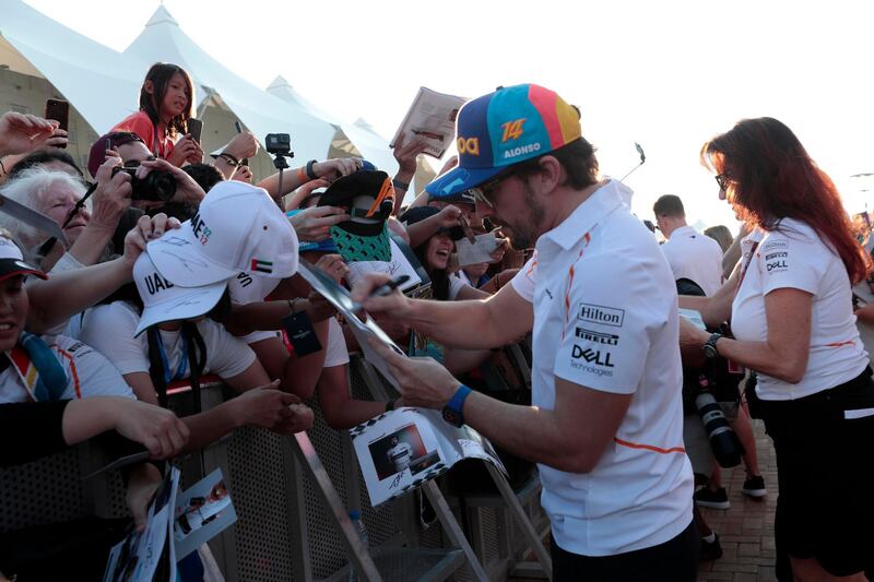 Fernando Alonso greets his fans during an exclusive autograph signing session at Yas Marina Circuit. Courtesy Yas Marina Circuit