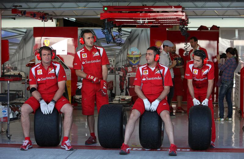 
ABU DHABI , UNITED ARAB EMIRATES  Ð  Nov 11 : Team members of Scuderia Ferrari during the Formula 1 first practice session at the Yas Marina Circuit in Abu Dhabi. ( Pawan Singh / The National ) For Sports. Story by Graham and Gary