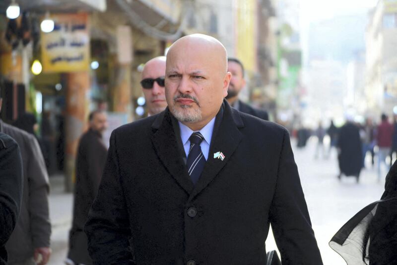 British lawyer Karim Asad Ahmad Khan walks in the streets of the holy city of Najaf in central Iraq during his visit to the war-torn country's Shiite Muslim Grand Ayatollah Ali Sistani on January 23, 2019. - Khan, an ex defence lawyer of Liberian former President Charles Taylor, heads a United Nations team authorized over a year ago to investigate the massacre of the Yazidi minority and other atrocities by jihadists in Iraq. 
The UN Security Council adopted a resolution in September 2017 to bring those responsible for Islamic State group war crimes to justice -- a cause championed by Nobel Peace Prize winner Nadia Murad and international human rights lawyer Amal Clooney. (Photo by Haidar HAMDANI / AFP)