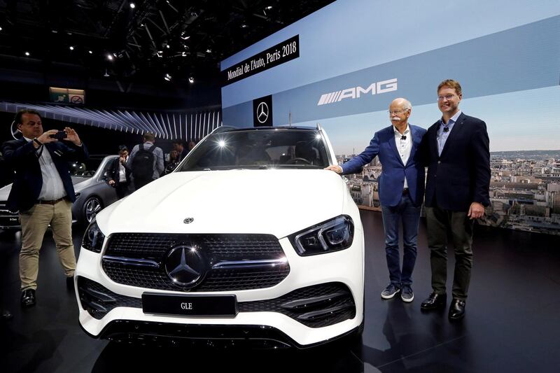 FILE PHOTO: Dieter Zetsche, chairman of the board of management of Daimler AG, and Ola Kallenius, member of the board of management of Daimler AG, present the Mercedes GLE during a press conference on the first press day of the Paris auto show, in Paris, France, October 2, 2018. REUTERS/Regis Duvignau/File Photo