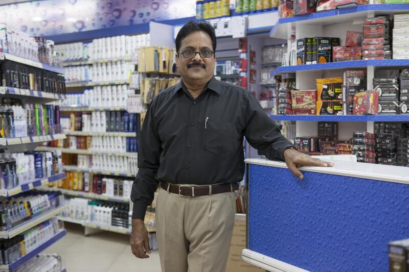 Valiyate Mohandasan, shop manager of Blue Mart in the Damac building in the newly rebranded Al Barsha Heights, doesn’t think the name change will affect business. Antonie Robertson / The National