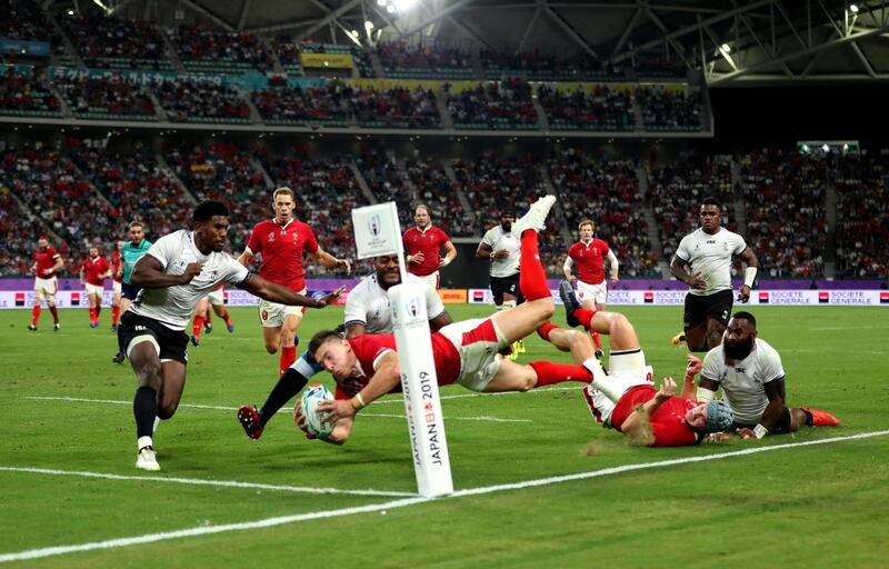 Wales' Josh Adams scores his sides third try during the 2019 Rugby World Cup Pool D match at Oita Stadium. PA Photo