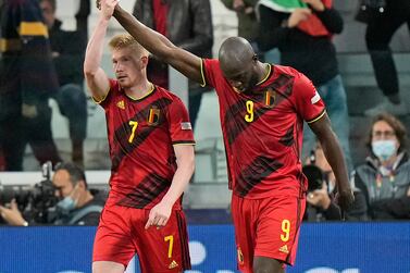 Belgium's Romelu Lukaku, right, celebrates with Kevin De Bruyne after scoring his side's second goal during the UEFA Nations League semifinal soccer match between Belgium and France at the Juventus stadium, in Turin, Italy, Thursday, Oct.  7, 2021.  (AP Photo / Luca Bruno)