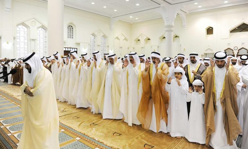 Sheikh Saud bin Rashid Al Mualla, Ruler of Umm al Quwain, attends Eid prayers. Courtesy Wam