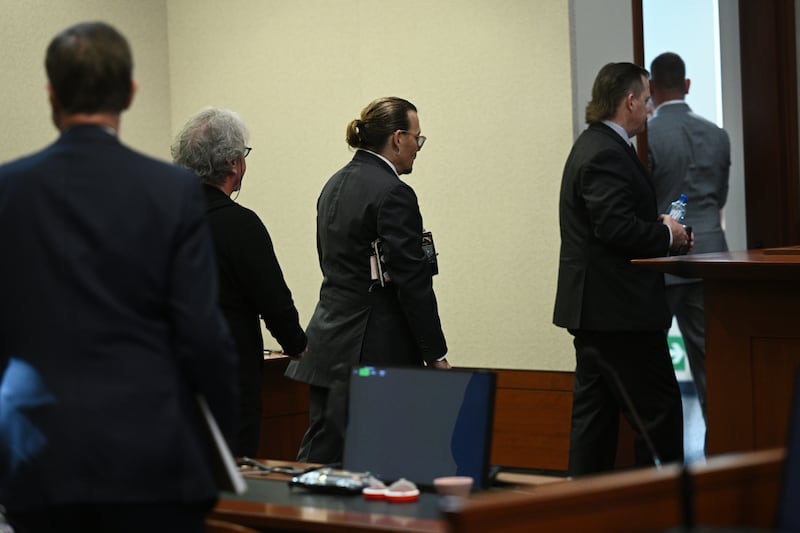 Depp departs the courtroom. EPA