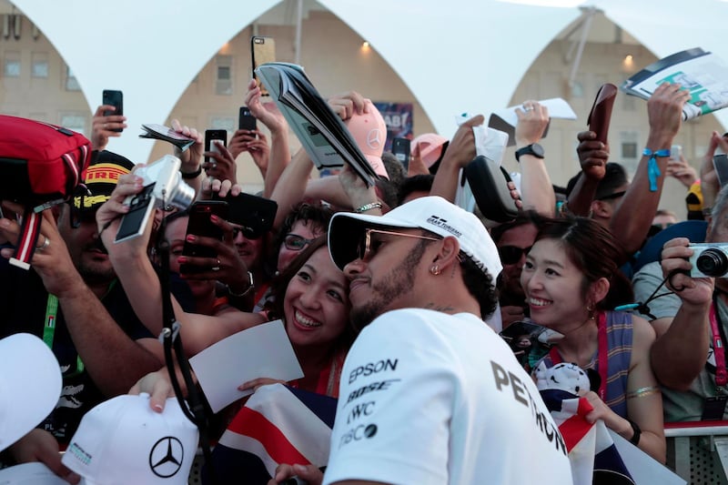 Lewis Hamilton greets his fans during an exclusive autograph signing session at Yas Marina Circuit. Courtesy Yas Marina Circuit