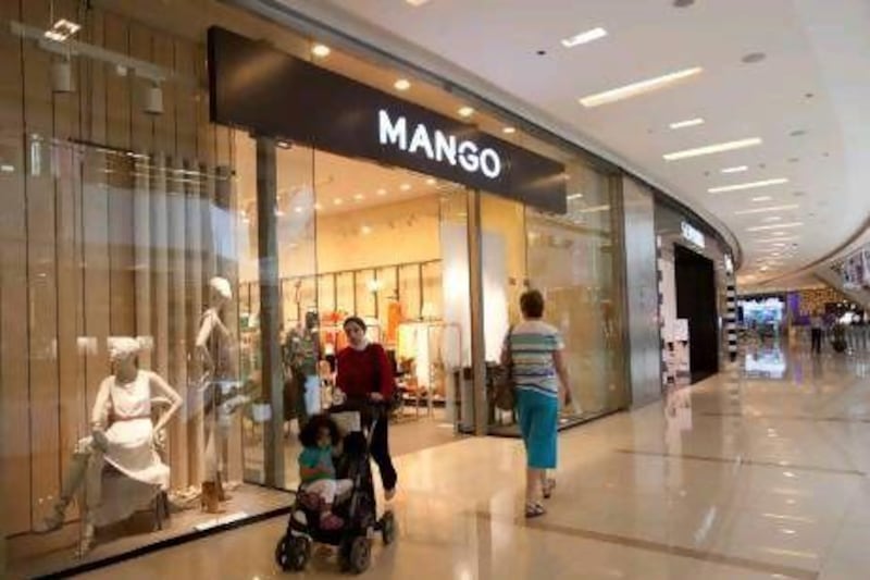 Of three brands surveyed - Mango, H&M and Zara - Mango was similar in price or cheaper here than in other countries. Razan Alzayani / The National