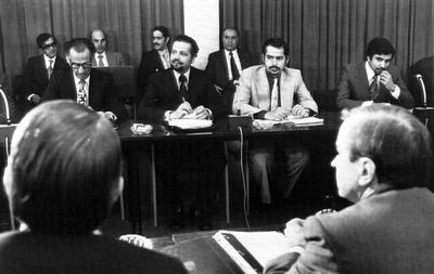 FILE - In this Oct. 8, 1973, file photo, oil ministers of six Persian Gulf countries and representatives of western nations meet in Vienna, Austria, to negotiate price boosts sought by oil producers. Facing each other, are from left to right, Dr. Jamshid Amouzegar, then Iran Finance Minister, then Saudi Oil Minister Ahmed Zaki Yanani. Yamani, a long-serving oil minister in Saudi Arabia who led the kingdom through the 1973 oil crisis, the nationalization its state energy company and later found himself kidnapped by the assassin Carlos the Jackal, died Tuesday, Feb. 23, 2021, in London. He was 90. (AP Photo, File)