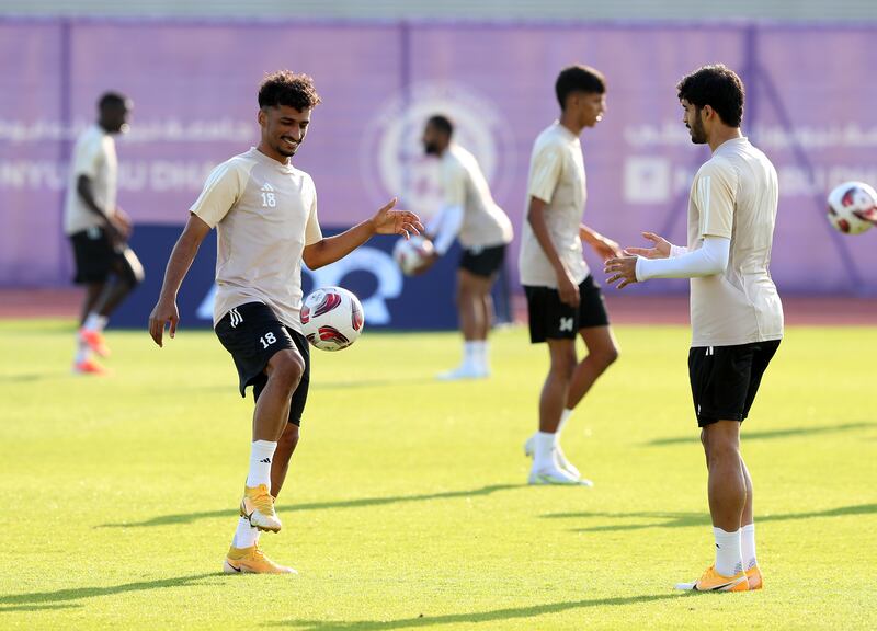 Abdullah Ramadan, left, takes part in a UAE training session.