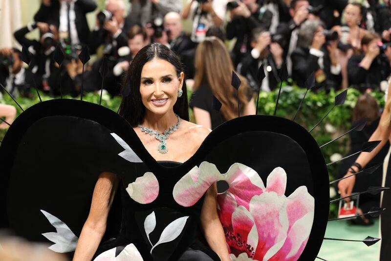 Demi Moore in Cartier jewellery and a Harris Reed gown. AFP