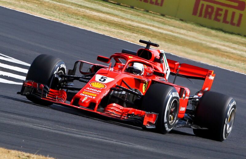 epa06867887 German Formula One driver Sebastian Vettel of Scuderia Ferrari in action at Luffield corner during the first practice session of the Formula One Grand Prix of Great Britain at the Silverstone circuit in Northamptonshire, Britain, 06 July 2018. The 2018 Formula One Grand Prix of Great Britain will take place on 08 July.  EPA/GEOFF CADDICK