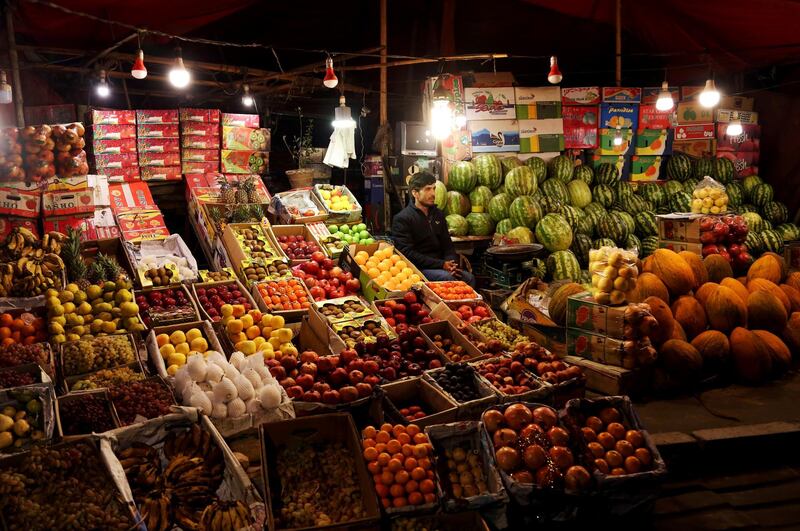 An Afghan street vendor waits for customers in Kabul. AP Photo