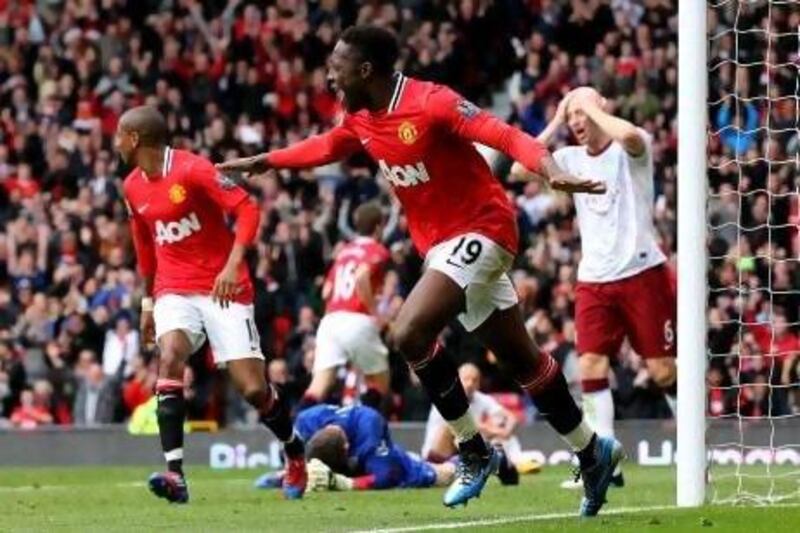 Danny Welbeck, centre, of Manchester United, celebrates scoring his team's second goal in their 4-0 victory over visiting Aston Villa on Sunday.